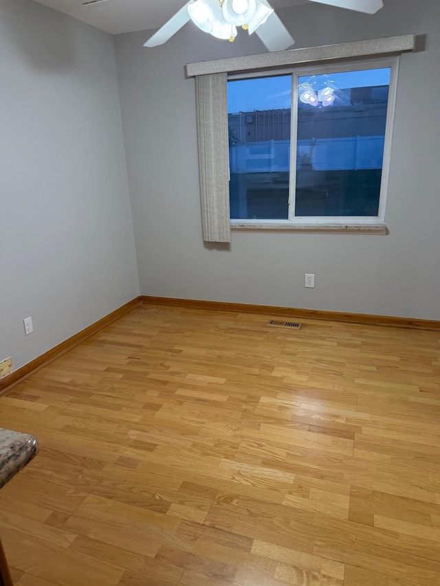 12806 Via Catherina Dr, Grand Blanc, MI 48439 - spare room with light wood-style flooring and ceiling fan