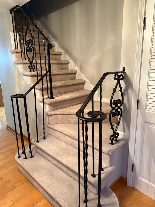 12806 Via Catherina Dr, Grand Blanc, MI 48439 - stairs featuring wood finished floors