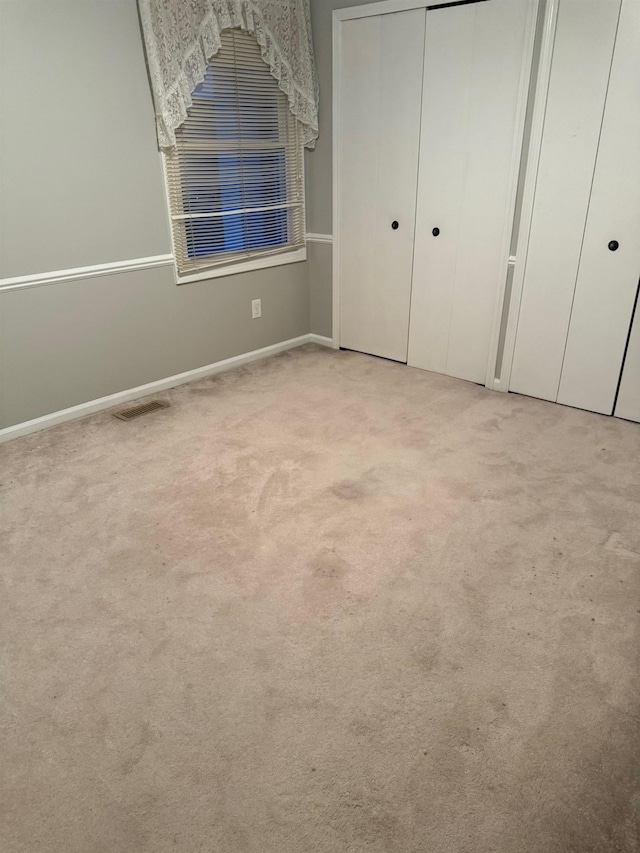 12806 Via Catherina Dr, Grand Blanc, MI 48439 - unfurnished bedroom with light carpet and baseboards