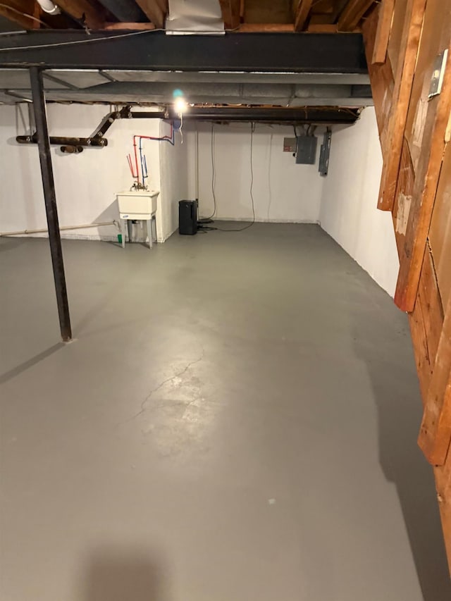 12806 Via Catherina Dr, Grand Blanc, MI 48439 - unfinished basement with a sink