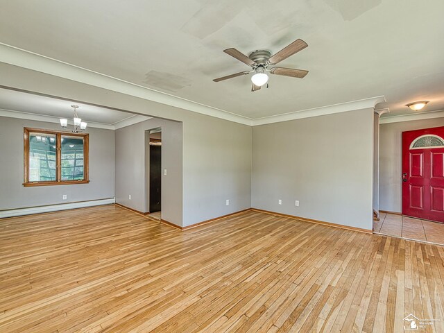 855 Mildred Ave, Temperance, MI 48182 - unfurnished room with a baseboard heating unit, hardwood / wood-style flooring, ornamental molding, and ceiling fan