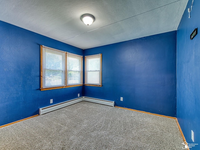 855 Mildred Ave, Temperance, MI 48182 - carpeted spare room featuring a textured ceiling and a baseboard radiator