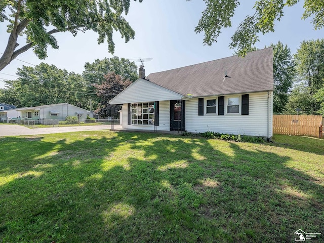 855 Mildred Ave, Temperance, MI 48182 - view of front of house featuring a chimney and a shingled roof