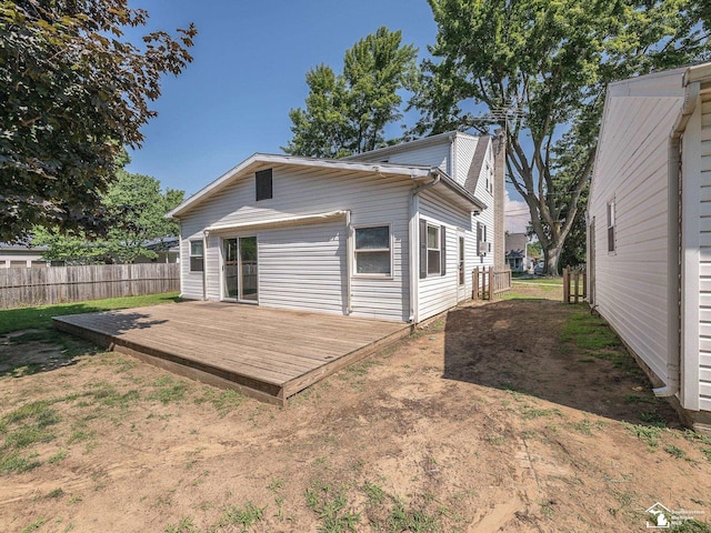855 Mildred Ave, Temperance, MI 48182 - rear view of house with a wooden deck and a chimney