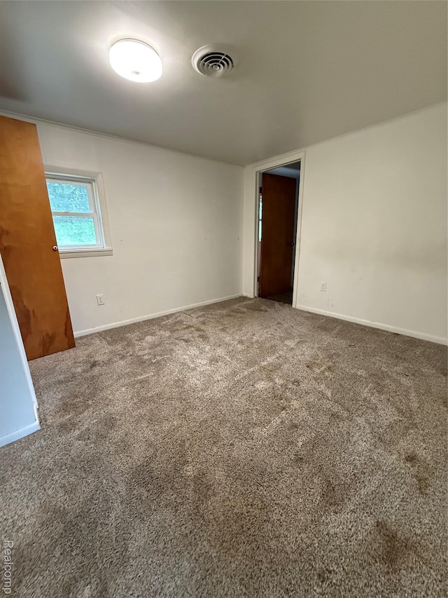 7601 Kimball Rd, Lyons, MI 48851 - carpeted empty room featuring baseboards