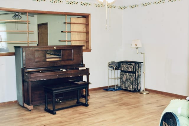 2582 Vista Lake Dr, Benton Harbor, MI 49022 - living area with wood finished floors and ceiling fan