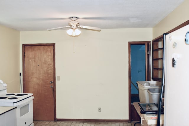 2582 Vista Lake Dr, Benton Harbor, MI 49022 - kitchen with electric range, ceiling fan, and light countertops