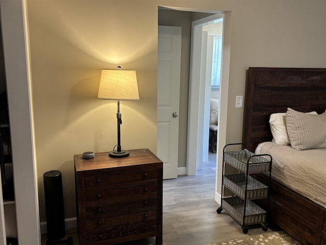 4442 Congdon Dr, Williamston, MI 48895 - bedroom featuring light wood-style flooring and baseboards