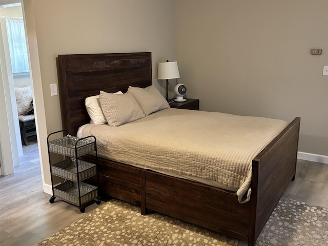 4442 Congdon Dr, Williamston, MI 48895 - bedroom with wood finished floors and baseboards