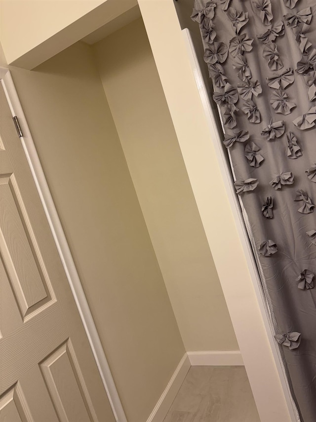 4442 Congdon Dr, Williamston, MI 48895 - bathroom featuring baseboards