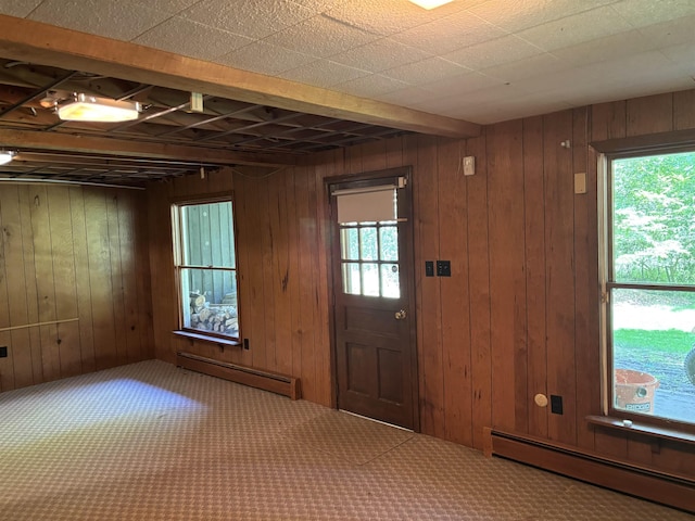 4442 Congdon Dr, Williamston, MI 48895 - carpeted foyer entrance with a baseboard radiator and wooden walls