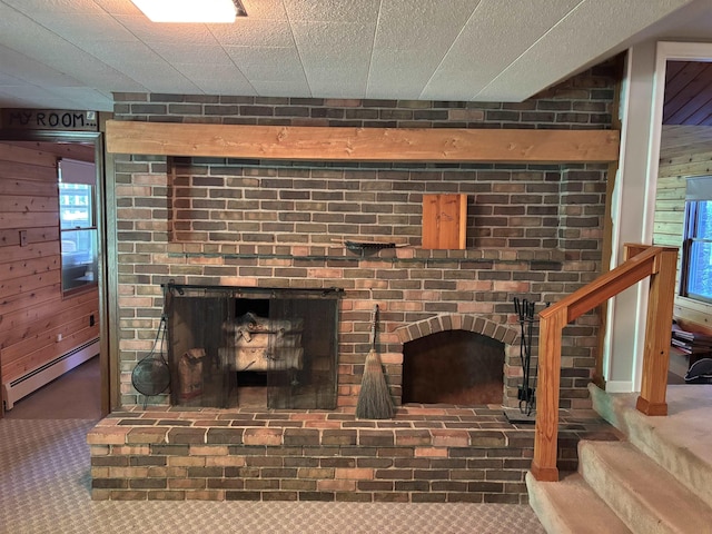 4442 Congdon Dr, Williamston, MI 48895 - detailed view of a baseboard radiator and a fireplace