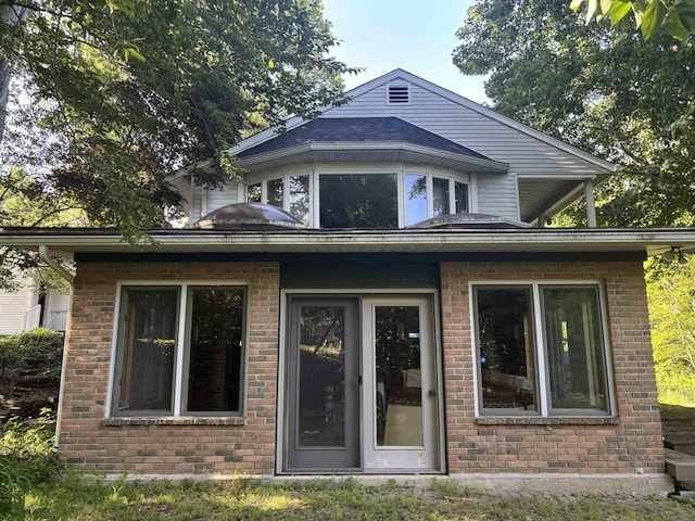 4442 Congdon Dr, Williamston, MI 48895 - rear view of property with brick siding