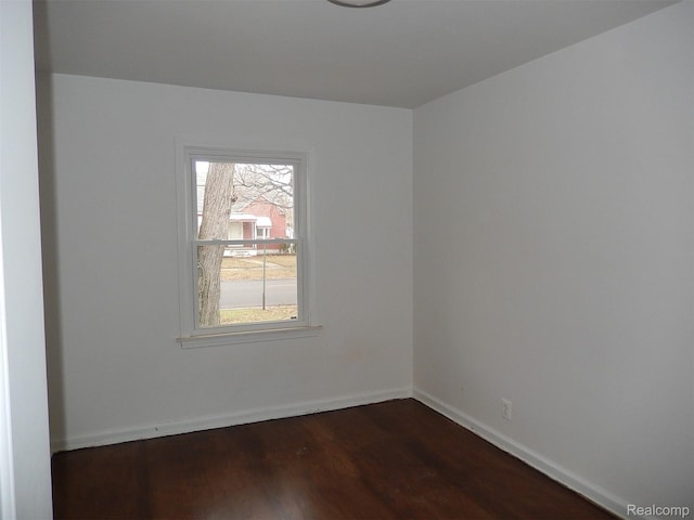 3161 Fort Park Blvd, Lincoln Park, MI 48146 - unfurnished room featuring dark wood finished floors and baseboards