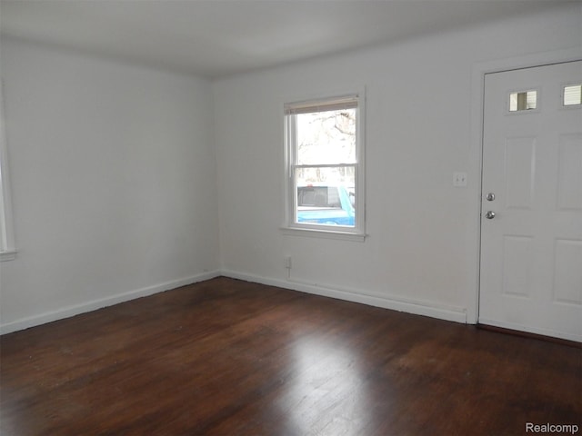 3161 Fort Park Blvd, Lincoln Park, MI 48146 - entrance foyer featuring dark wood finished floors and baseboards