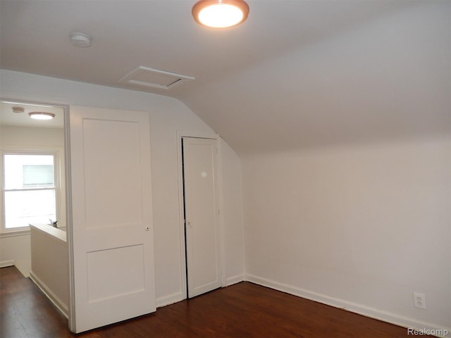 3161 Fort Park Blvd, Lincoln Park, MI 48146 - additional living space featuring vaulted ceiling and dark wood-style flooring