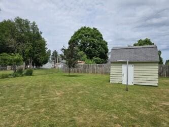 109 W Woodrow St, Fremont, MI 49412 - view of yard featuring a storage unit