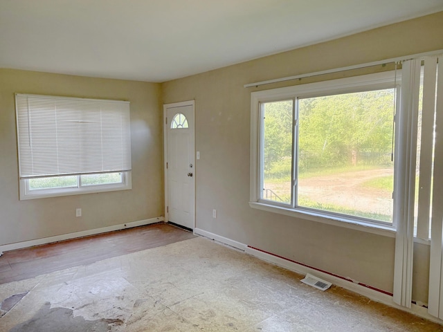 4299 N Belsay Rd, Flint, MI 48506 - entryway with baseboards and wood finished floors