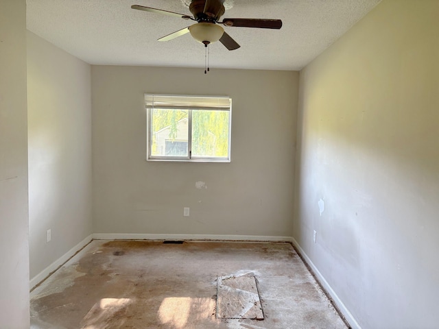 4299 N Belsay Rd, Flint, MI 48506 - spare room featuring a textured ceiling and ceiling fan