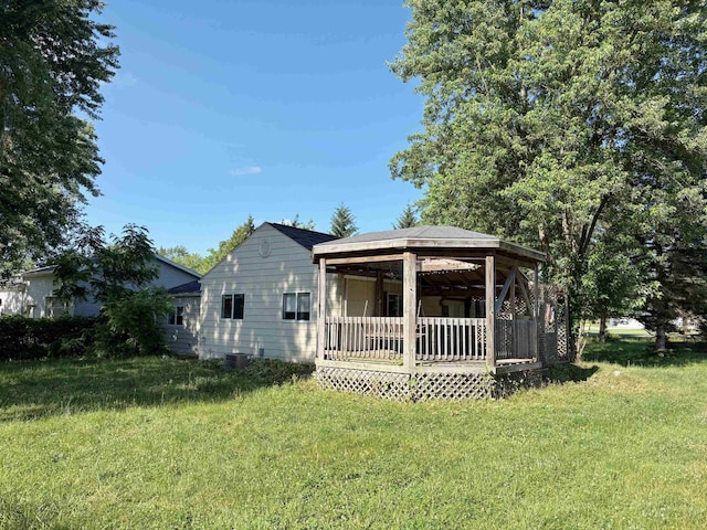 4299 N Belsay Rd, Flint, MI 48506 - rear view of property with a yard and a gazebo