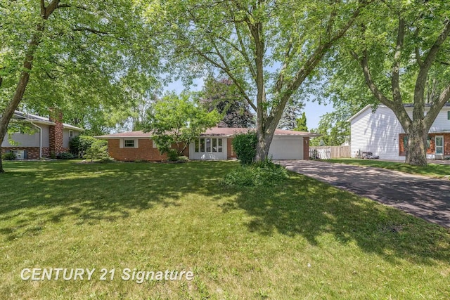9 Wiltse Ct, Saginaw, MI 48603 - ranch-style home with a garage