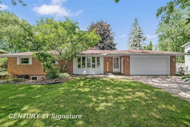 9 Wiltse Ct, Saginaw, MI 48603 - view of front of house with an attached garage, driveway, a front yard, and brick siding