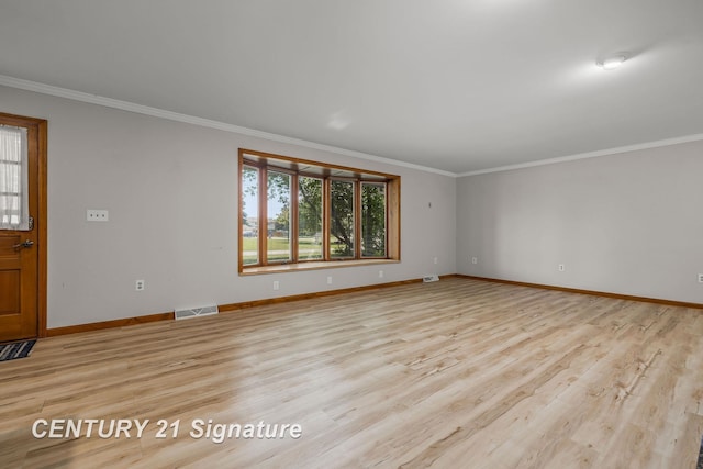 9 Wiltse Ct, Saginaw, MI 48603 - spare room featuring light wood finished floors and crown molding