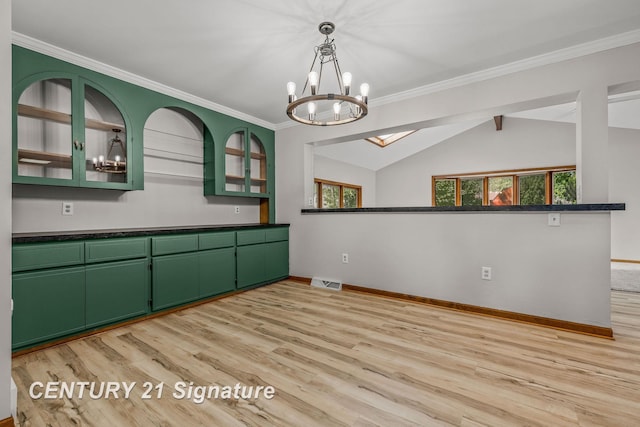 9 Wiltse Ct, Saginaw, MI 48603 - unfurnished dining area with light wood-type flooring, a chandelier, crown molding, and vaulted ceiling