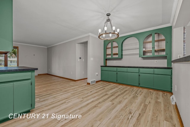 9 Wiltse Ct, Saginaw, MI 48603 - unfurnished dining area featuring a chandelier, light wood-type flooring, and crown molding