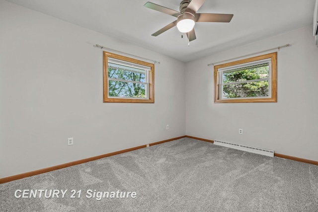 9 Wiltse Ct, Saginaw, MI 48603 - carpeted spare room with a baseboard radiator, healthy amount of natural light, and ceiling fan
