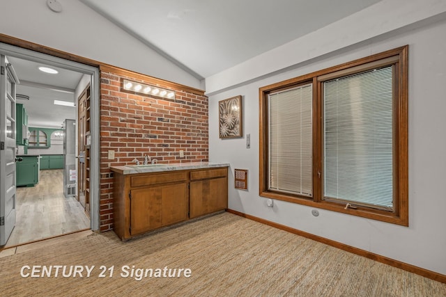 9 Wiltse Ct, Saginaw, MI 48603 - bar with vaulted ceiling and a sink