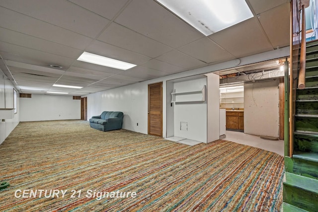 9 Wiltse Ct, Saginaw, MI 48603 - finished below grade area featuring carpet, a drop ceiling, and washer / dryer