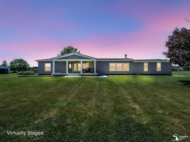 8955 Grafton Rd, Newport, MI 48166 - view of front of home featuring a lawn and covered porch
