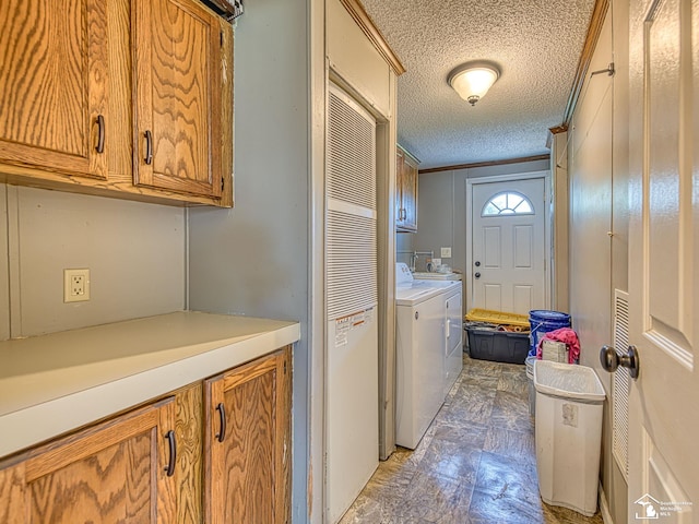 8955 Grafton Rd, Newport, MI 48166 - washroom featuring cabinet space, washing machine and dryer, and a textured ceiling