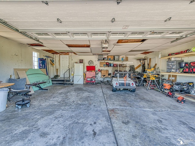 8955 Grafton Rd, Newport, MI 48166 - garage featuring freestanding refrigerator