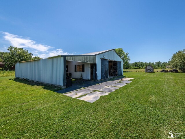 8955 Grafton Rd, Newport, MI 48166 - view of pole building with a yard