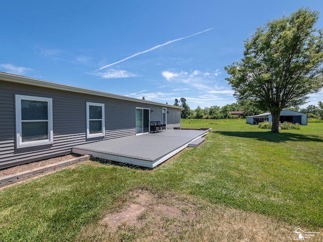 8955 Grafton Rd, Newport, MI 48166 - view of green lawn featuring a deck