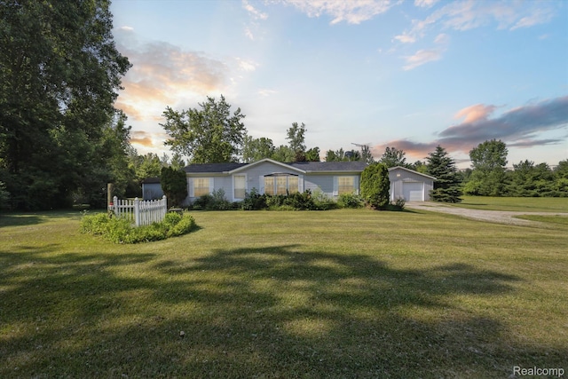 4591 Swaffer Rd, Millington, MI 48746 - view of front facade with a front lawn, driveway, and a garage