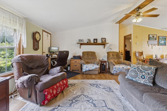 4591 Swaffer Rd, Millington, MI 48746 - living room featuring wood finished floors, a ceiling fan, and ornamental molding