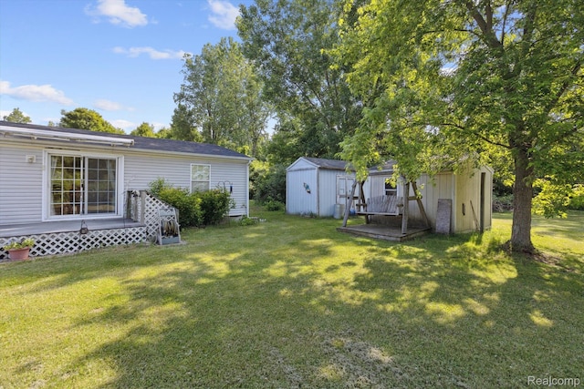4591 Swaffer Rd, Millington, MI 48746 - view of green lawn with a storage unit