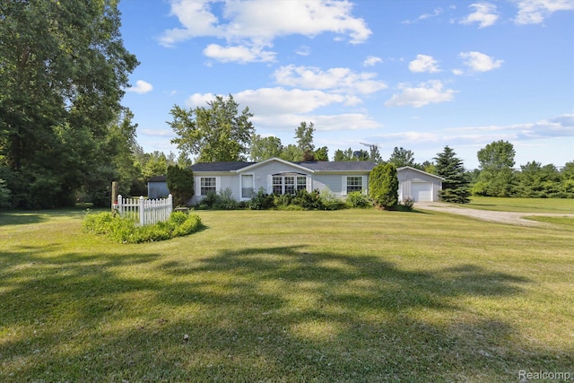 4591 Swaffer Rd, Millington, MI 48746 - ranch-style home featuring driveway, an outbuilding, and a detached garage