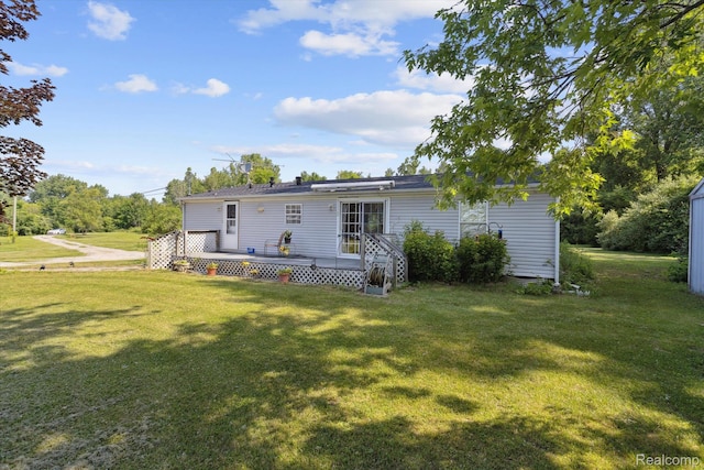 4591 Swaffer Rd, Millington, MI 48746 - view of front facade with a front lawn and a deck