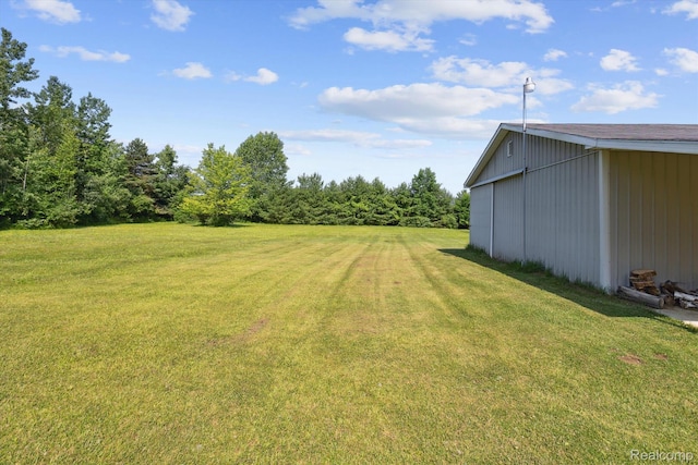 4591 Swaffer Rd, Millington, MI 48746 - view of green lawn featuring an outbuilding and an outdoor structure