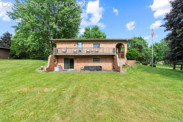 945 E Gunn Rd, Rochester, MI 48306 - rear view of house featuring brick siding, a lawn, a patio, and a deck