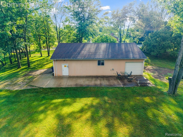 945 E Gunn Rd, Rochester, MI 48306 - view of outbuilding with view of wooded area