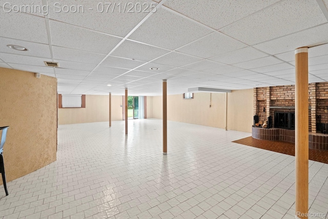945 E Gunn Rd, Rochester, MI 48306 - basement featuring a fireplace and a paneled ceiling