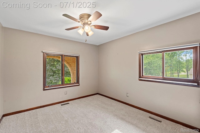 945 E Gunn Rd, Rochester, MI 48306 - carpeted empty room with healthy amount of natural light and a ceiling fan
