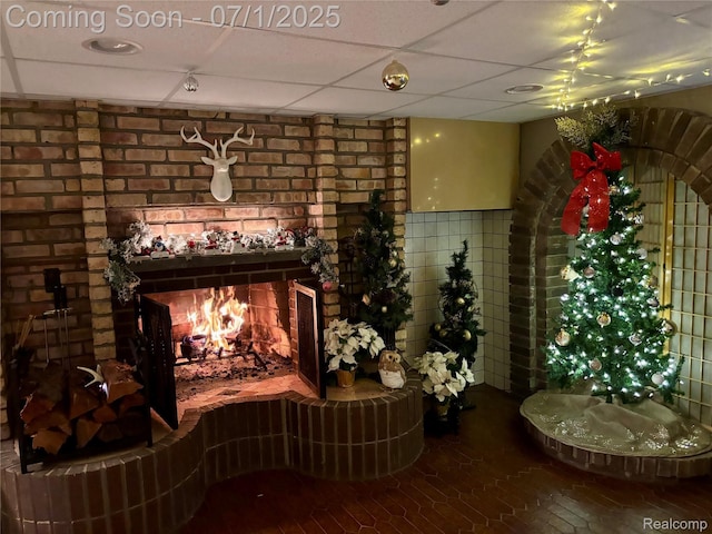 945 E Gunn Rd, Rochester, MI 48306 - wine room featuring a drop ceiling and a brick fireplace