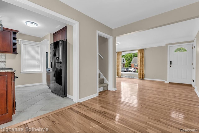 1717 Penistone St, Birmingham, MI 48009 - foyer featuring stairs and light wood-style floors