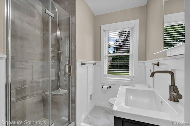 1717 Penistone St, Birmingham, MI 48009 - full bath with marble finish floors, vanity, wainscoting, healthy amount of natural light, and a shower stall